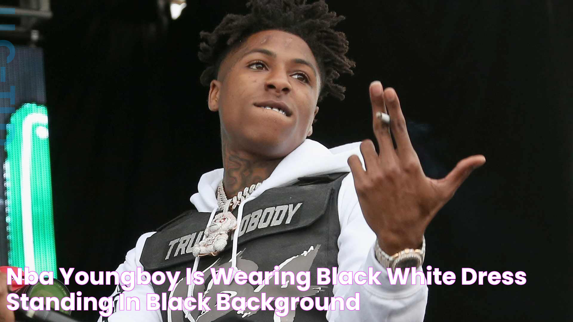 NBA Youngboy Is Wearing Black White Dress Standing In Black Background